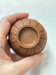 A set of five Chinese Yixing stoneware cups with floral design, Kangxi