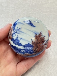 A fine Chinese blue, white and copper-red 'riverscape' seal paste box and cover, Kangxi mark, 19/20th C.