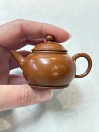 A small Chinese Yixing stoneware covered teapot and two Swatow Yixing-style covered teapots, Yixing Hui Mengchen 宜興惠孟臣製 and Shunji 順記 marks, 19/20th C