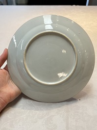 A pair of Chinese famille rose plates with a lady and boys in a boat, Yongzheng/Qianlong