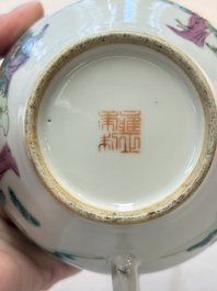 A Chinese famille rose teapot with ladies in a garden, Yongzheng mark, 19th C.