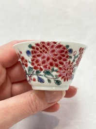 Two Chinese famille rose cups and saucers with birds and flowering branches, Yongzheng