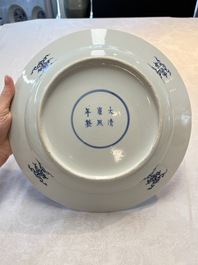 A Chinese blue and white dish with floral design, Kangxi mark, 19th C.