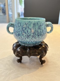 A Chinese robin's egg-glazed censer on a wooden stand and a copper-red-glazed seal paste box and cover, 19/20th C.