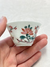 Two Chinese famille rose cups and saucers with birds and flowering branches, Yongzheng