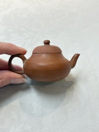 A small Chinese Yixing stoneware covered teapot and two Swatow Yixing-style covered teapots, Yixing Hui Mengchen 宜興惠孟臣製 and Shunji 順記 marks, 19/20th C