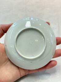 Two Chinese famille rose cups and saucers with birds and flowering branches, Yongzheng