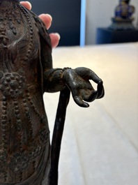 A fine and large Chinese bronze standing Buddha, possibly Liao