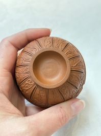 A set of five Chinese Yixing stoneware cups with floral design, Kangxi