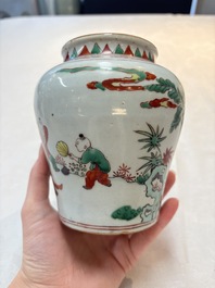 A small Chinese wucai jar with figures in a landscape, Transitional period