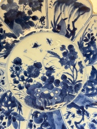 A pair of Chinese blue and white lotus-form 'grasshopper' plates, Kangxi