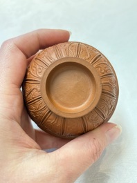 A set of five Chinese Yixing stoneware cups with floral design, Kangxi