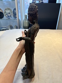 A fine and large Chinese bronze standing Buddha, possibly Liao