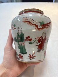 A pair of small Chinese wucai jars with sages in a landscape, Transitional period