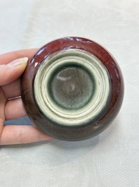 A Chinese robin's egg-glazed censer on a wooden stand and a copper-red-glazed seal paste box and cover, 19/20th C.