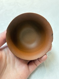 A set of five Chinese Yixing stoneware cups with floral design, Kangxi
