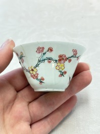 Two Chinese famille rose cups and saucers with birds and flowering branches, Yongzheng