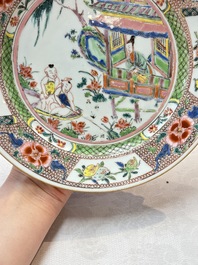 A pair of Chinese famille rose plates with a lady and boys in a boat, Yongzheng/Qianlong