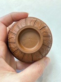 A set of five Chinese Yixing stoneware cups with floral design, Kangxi