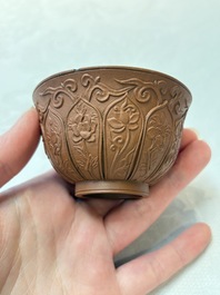 A set of five Chinese Yixing stoneware cups with floral design, Kangxi