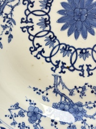 A Chinese blue and white dish with floral design, Kangxi mark, 19th C.