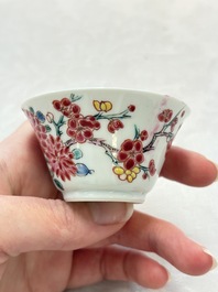Two Chinese famille rose cups and saucers with birds and flowering branches, Yongzheng