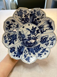 A pair of Chinese blue and white lotus-form 'grasshopper' plates, Kangxi