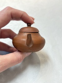 A small Chinese Yixing stoneware covered teapot and two Swatow Yixing-style covered teapots, Yixing Hui Mengchen 宜興惠孟臣製 and Shunji 順記 marks, 19/20th C