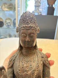 A fine and large Chinese bronze standing Buddha, Liao/Jin