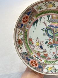 A pair of Chinese famille rose plates with a lady and boys in a boat, Yongzheng/Qianlong