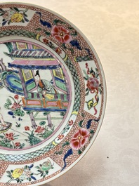 A pair of Chinese famille rose plates with a lady and boys in a boat, Yongzheng/Qianlong