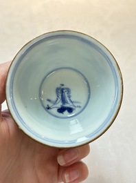 A Chinese blue and white 'flying horses' cup, Da Qing Bing Wu Nian Zhi 大清丙午年製 mark, dated 1666