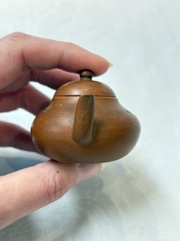 A small Chinese Yixing stoneware covered teapot and two Swatow Yixing-style covered teapots, Yixing Hui Mengchen 宜興惠孟臣製 and Shunji 順記 marks, 19/20th C