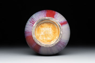 A Chinese flamb&eacute;-glazed bottle vase, Qianlong mark, 19/20th C.