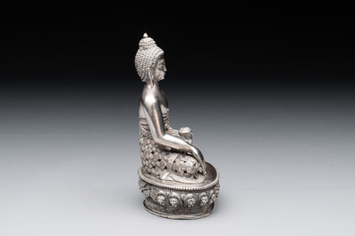 A fine Nepalese silver Buddha, 20th C.