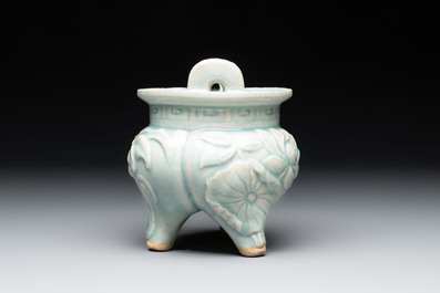 A Chinese qingbai tripod censer with floral relief design, Song/Yuan
