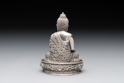 A fine Nepalese silver Buddha, 20th C.