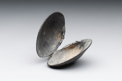 A small Chinese silver clam-shaped box with animals design, Tang/Song