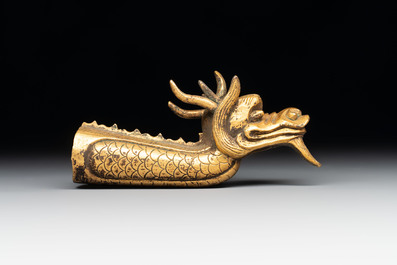 A Chinese gilt-bronze ornament in the form of a dragon, 18th C.