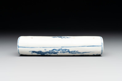 A Chinese blue and white wrist rest with figural design, 19th C.