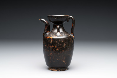 A Chinese Jizhou tortoiseshell-glazed tea bowl, a ewer and a black-glazed vase, Jin and later