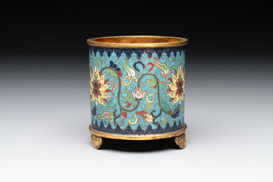 A Chinese cloisonn&eacute; cylindrical tripod censer with lotus scrolls, Qianlong mark and of the period