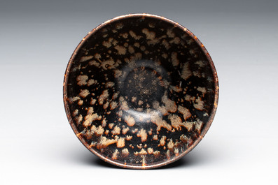 A Chinese Jizhou tortoiseshell-glazed tea bowl, a ewer and a black-glazed vase, Jin and later