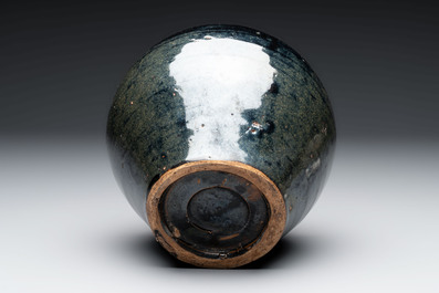 A Chinese Jizhou tortoiseshell-glazed tea bowl, a ewer and a black-glazed vase, Jin and later
