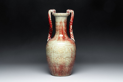 A Chinese peachbloom-glazed vase with dragon-form handles, 18th C.