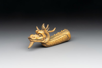 A Chinese gilt-bronze ornament in the form of a dragon, 18th C.