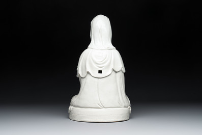A Chinese white-glazed Guanyin, Kangxi mark, 19th C.