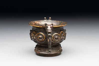 A Chinese archaistic gold and silver-inlaid bronze miniature censer, Ming
