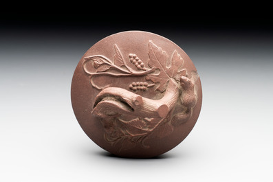 A Chinese Yixing stoneware 'squirrels among grapevines' teapot and cover, Kangxi