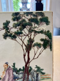 A Chinese famille rose plaque with a sage and a lady in a garden, signed Huang Can 黃燦, Republic
